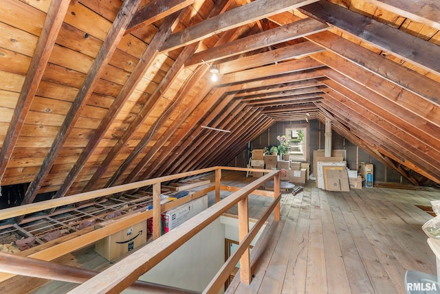 3110 Arlington Ave, Davenport, IA 52803 - attic featuring an upstairs landing