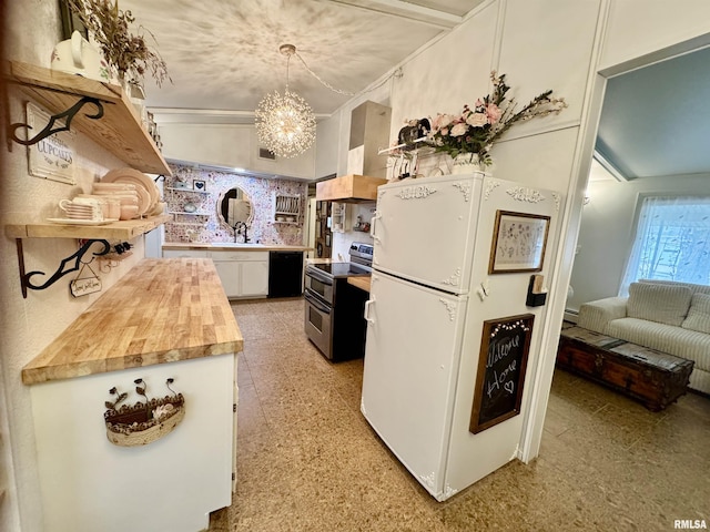 1401 12th Ave, Viola, IL 61486 - kitchen with range with two ovens, freestanding refrigerator, black dishwasher, decorative backsplash, and white cabinets