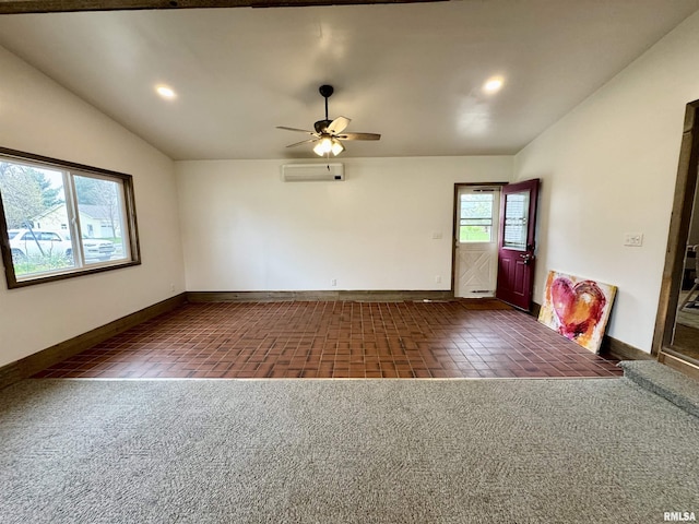 1401 12th Ave, Viola, IL 61486 - unfurnished room featuring lofted ceiling, ceiling fan, recessed lighting, a wall mounted AC, and dark colored carpet
