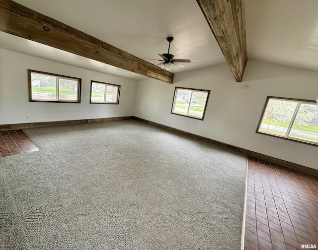 1401 12th Ave, Viola, IL 61486 - spare room featuring a ceiling fan, dark carpet, and dark tile patterned floors