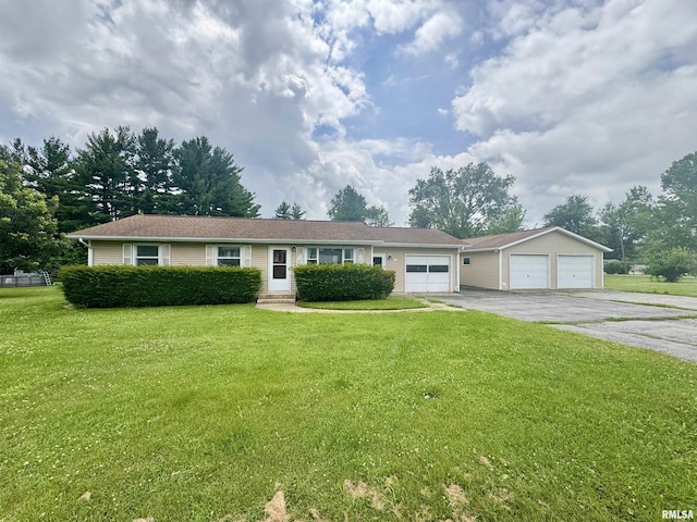 15 5th St, Matherville, IL 61263 - ranch-style house with a front yard and a garage