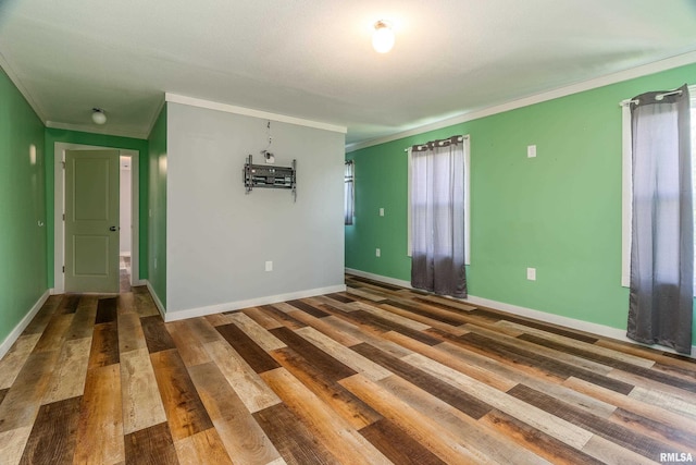 503 W Idaho Ave, Carterville, IL 62918 - empty room featuring crown molding, wood finished floors, and a chandelier