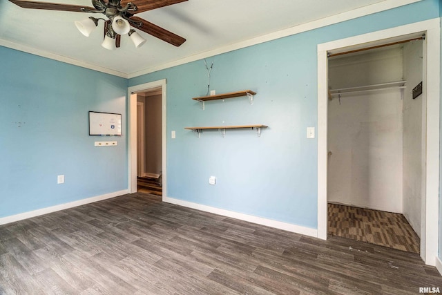 503 W Idaho Ave, Carterville, IL 62918 - unfurnished bedroom with wood finished floors, a closet, ornamental molding, and a ceiling fan