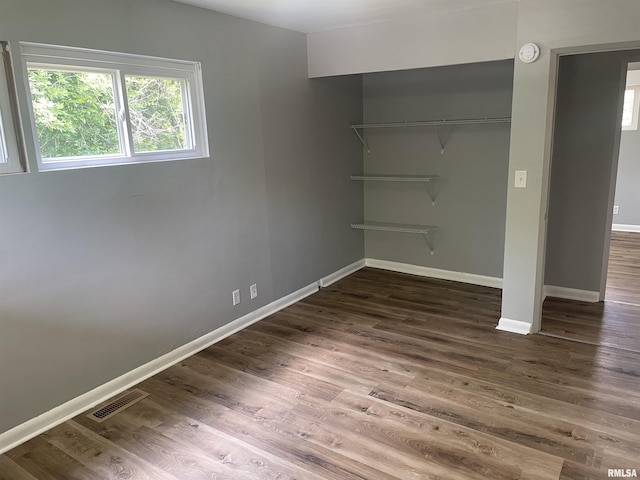 304 Lynda Dr Unit A/B, Carbondale, IL 62901 - unfurnished bedroom with a closet and wood finished floors