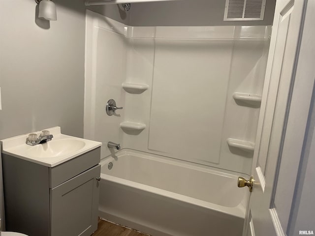 304 Lynda Dr Unit A/B, Carbondale, IL 62901 - full bathroom with bathing tub / shower combination, vanity, and wood finished floors