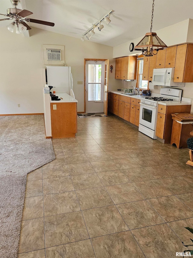 30154 395th Ave, Bellevue, IA 52031 - kitchen with white appliances, rail lighting, a chandelier, light countertops, and a ceiling fan