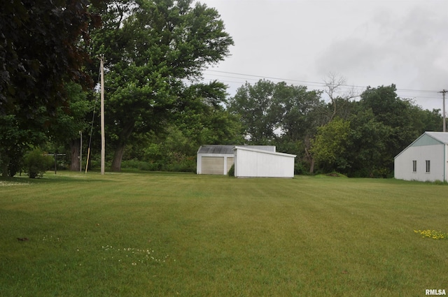 30154 395th Ave, Bellevue, IA 52031 - view of green lawn with an outdoor structure and a pole building