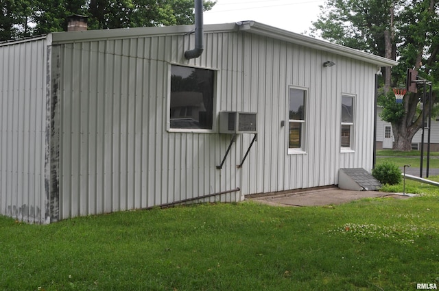 30154 395th Ave, Bellevue, IA 52031 - view of side of home with a yard, a chimney, and board and batten siding
