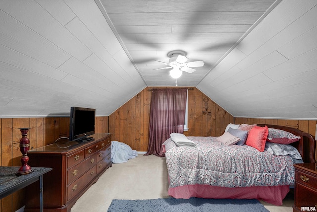 412 24th Ave, East Moline, IL 61244 - bedroom with carpet flooring, wooden walls, ceiling fan, and vaulted ceiling