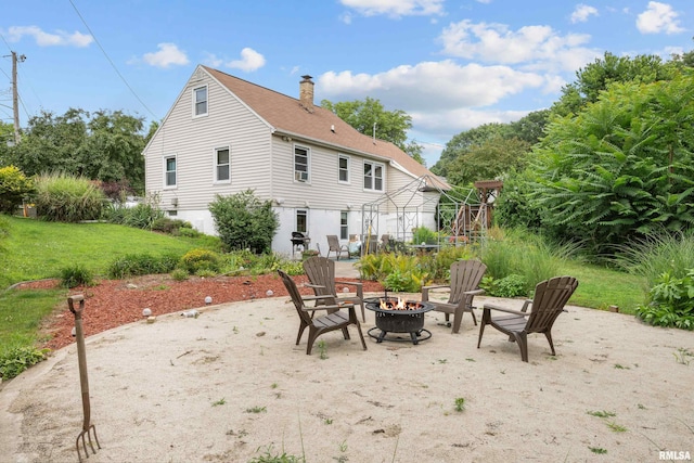 412 24th Ave, East Moline, IL 61244 - view of patio / terrace with a fire pit