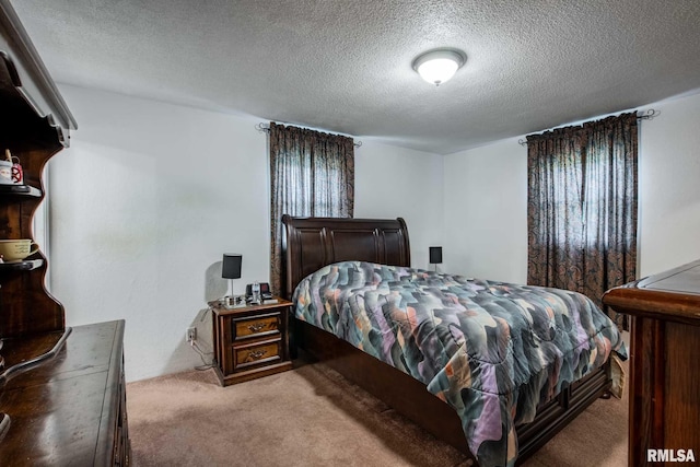 1903 Melvin Rd, West Frankfort, IL 62896 - bedroom with carpet flooring and a textured ceiling