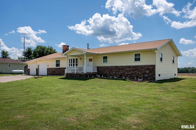 1903 Melvin Rd, West Frankfort, IL 62896 - ranch-style house with covered porch, brick siding, a front yard, concrete driveway, and a chimney