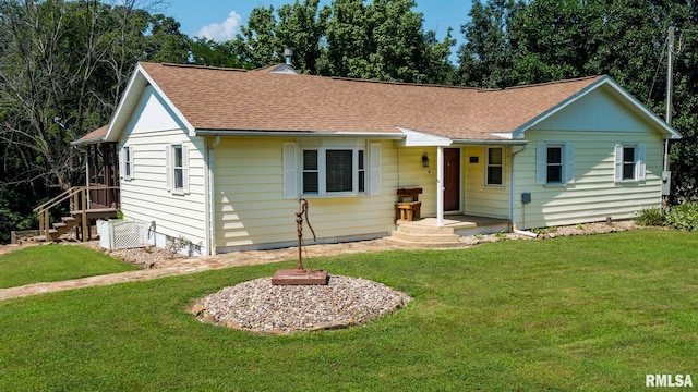 5680 State Route 146 E Highway, Vienna, IL 62995 - view of front facade featuring a front lawn and a shingled roof