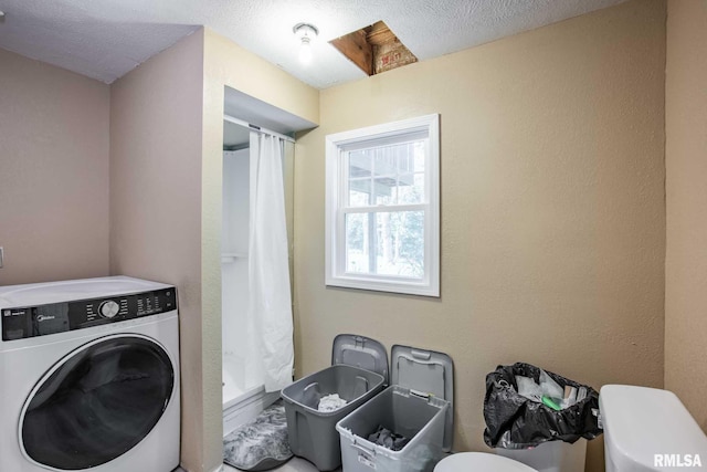 5680 State Route 146 E Highway, Vienna, IL 62995 - washroom featuring washer / dryer and a textured ceiling