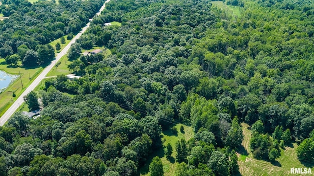 5680 State Route 146 E Highway, Vienna, IL 62995 - aerial view of property and surrounding area with a heavily wooded area