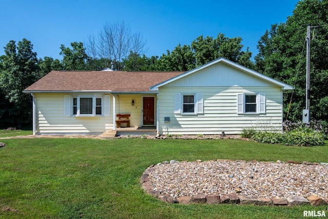 5680 State Route 146 E Highway, Vienna, IL 62995 - single story home featuring a front yard, a porch, and a shingled roof