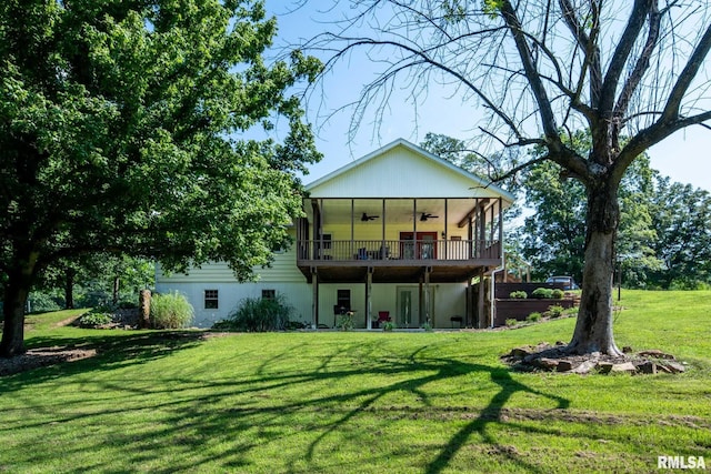 5680 State Route 146 E Highway, Vienna, IL 62995 - rear view of house featuring a ceiling fan, a lawn, and a deck
