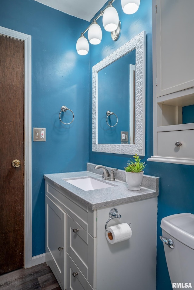 1817 W 3rd St, Milan, IL 61264 - half bath with vanity and wood finished floors