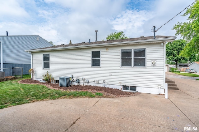 1817 W 3rd St, Milan, IL 61264 - back of house featuring a patio