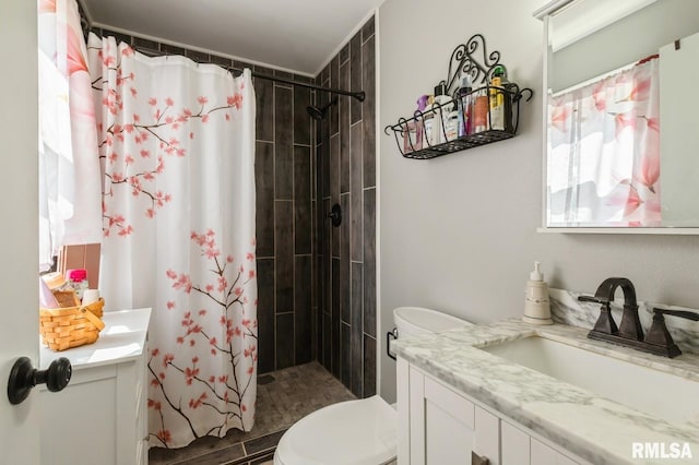 15611 Willow Ct, Sterling, IL 61081 - bathroom featuring vanity and tiled shower