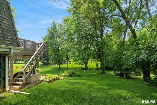 15611 Willow Ct, Sterling, IL 61081 - view of grassy yard featuring stairway and a wooden deck