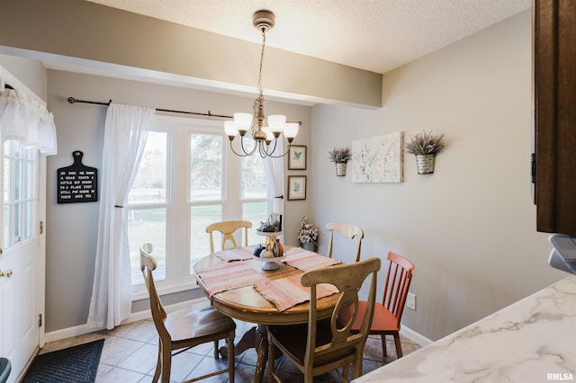 10224 Illinois Steel Rd, Johnston City, IL 62951 - dining space featuring a chandelier, a textured ceiling, and light tile patterned flooring