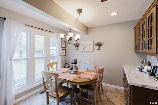 10224 Illinois Steel Rd, Johnston City, IL 62951 - dining area with a chandelier, a textured ceiling, light tile patterned floors, and recessed lighting
