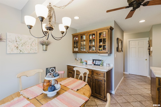 10224 Illinois Steel Rd, Johnston City, IL 62951 - dining space featuring a chandelier, light tile patterned floors, recessed lighting, and a ceiling fan
