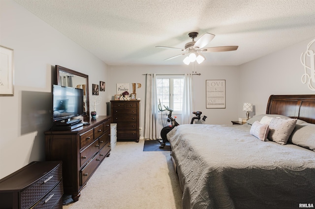 10224 Illinois Steel Rd, Johnston City, IL 62951 - bedroom featuring light colored carpet, a textured ceiling, and ceiling fan
