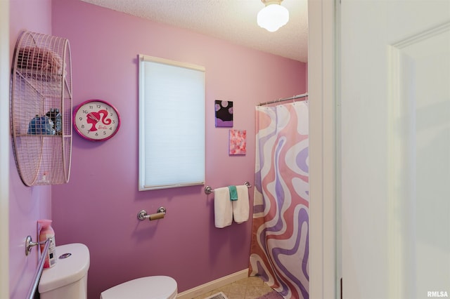10224 Illinois Steel Rd, Johnston City, IL 62951 - full bath with a textured ceiling, curtained shower, and tile patterned floors