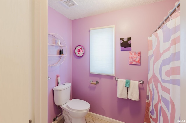 10224 Illinois Steel Rd, Johnston City, IL 62951 - bathroom featuring tile patterned floors, a textured ceiling, and a shower with curtain