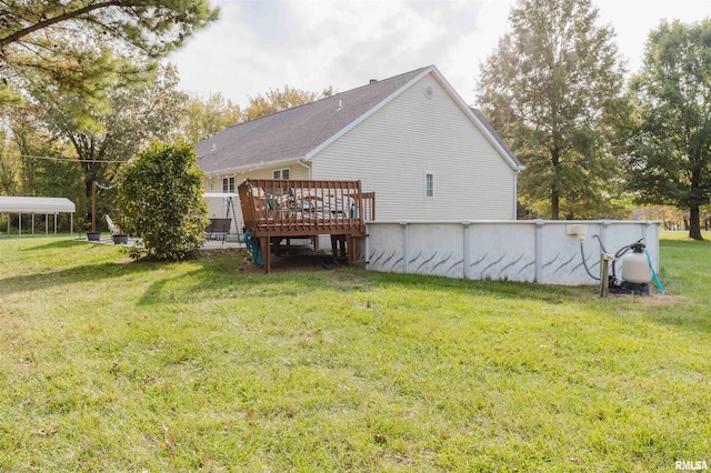 10224 Illinois Steel Rd, Johnston City, IL 62951 - back of property featuring a wooden deck and a lawn