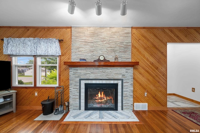 5003 48th St, Moline, IL 61265 - detailed view of wood walls, wood finished floors, and a fireplace