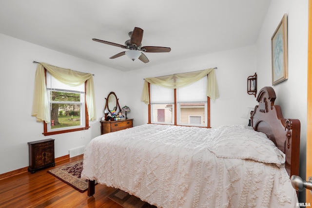 5003 48th St, Moline, IL 61265 - bedroom featuring wood finished floors and a ceiling fan