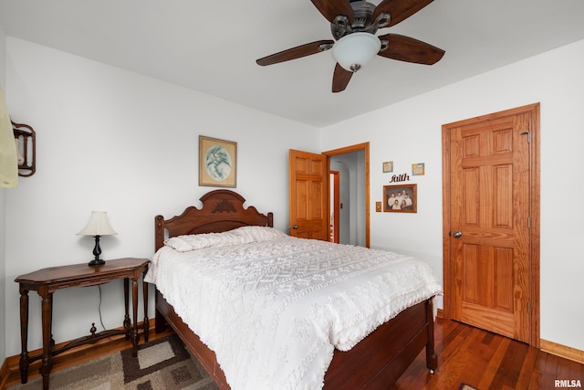 5003 48th St, Moline, IL 61265 - bedroom with dark wood-type flooring and ceiling fan