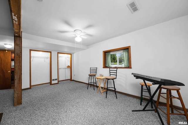 5003 48th St, Moline, IL 61265 - living area with a ceiling fan and carpet floors