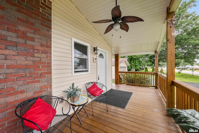 5003 48th St, Moline, IL 61265 - wooden porch featuring a ceiling fan