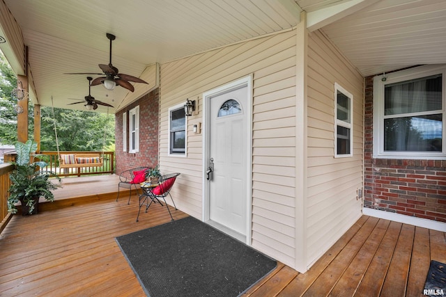 5003 48th St, Moline, IL 61265 - wooden porch with a ceiling fan