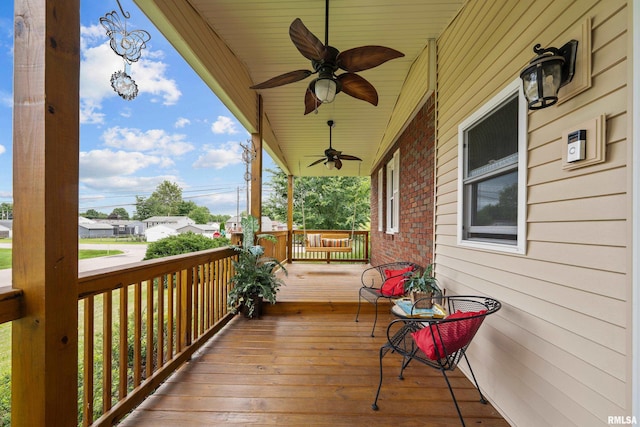 5003 48th St, Moline, IL 61265 - wooden porch featuring a ceiling fan