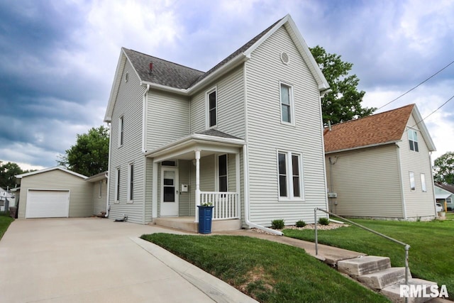 2024 Lind St, Quincy, IL 62301 - traditional home with a porch, a garage, a front yard, an outbuilding, and concrete driveway