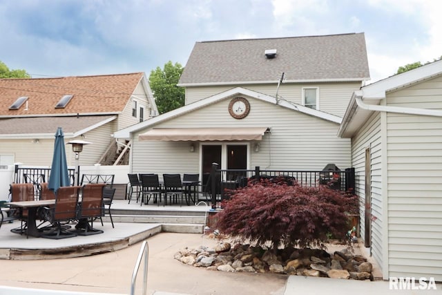 2024 Lind St, Quincy, IL 62301 - back of house featuring outdoor dining space and a patio area