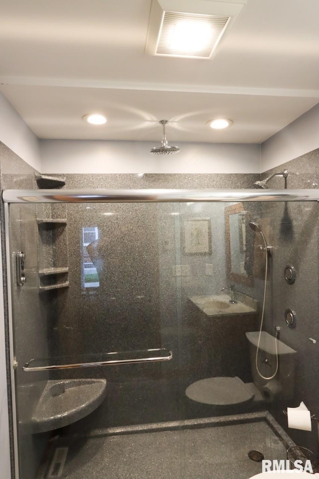 2024 Lind St, Quincy, IL 62301 - bathroom featuring a shower stall and a sink