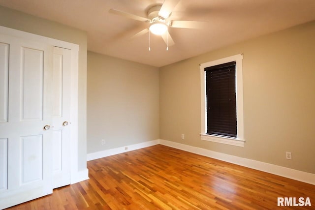 2024 Lind St, Quincy, IL 62301 - unfurnished bedroom with wood finished floors and ceiling fan