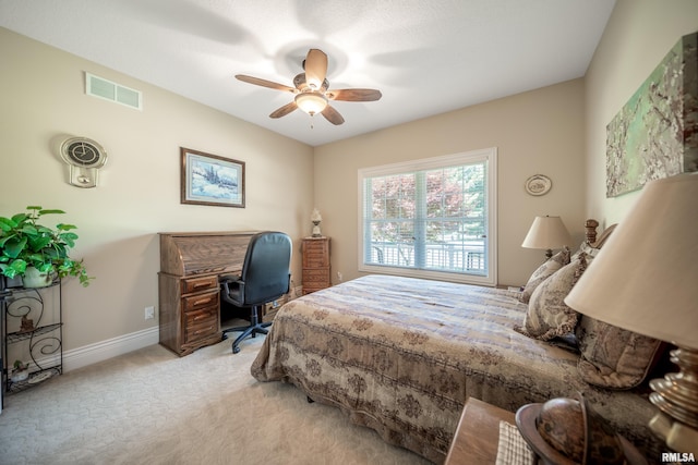 627 10th Ave, Silvis, IL 61282 - bedroom featuring light carpet and ceiling fan