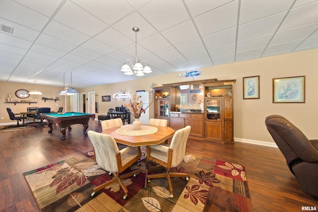 627 10th Ave, Silvis, IL 61282 - dining area with dark wood-style floors, pool table, and a chandelier