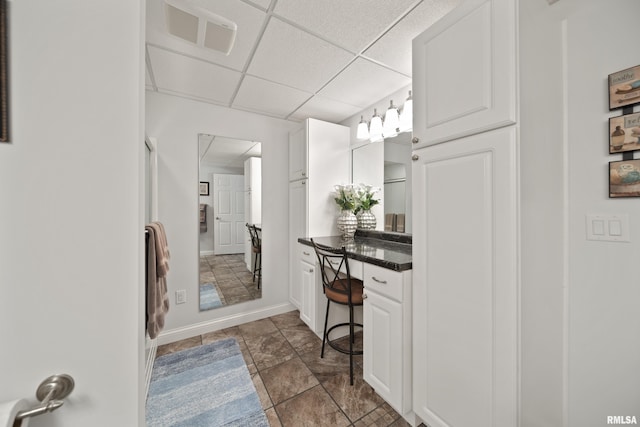 627 10th Ave, Silvis, IL 61282 - bathroom with a drop ceiling and vanity