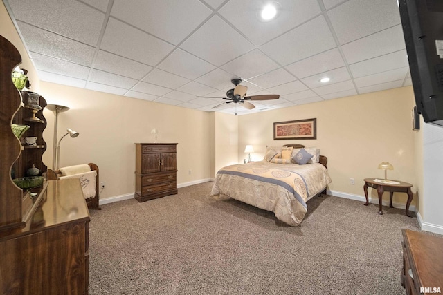 627 10th Ave, Silvis, IL 61282 - bedroom with carpet, a drop ceiling, and a ceiling fan