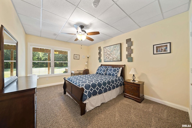 627 10th Ave, Silvis, IL 61282 - carpeted bedroom featuring a paneled ceiling and a ceiling fan
