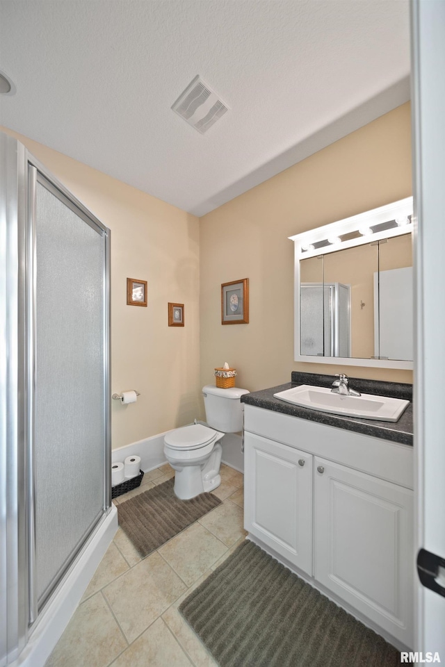 627 10th Ave, Silvis, IL 61282 - full bath with a stall shower, vanity, and tile patterned flooring