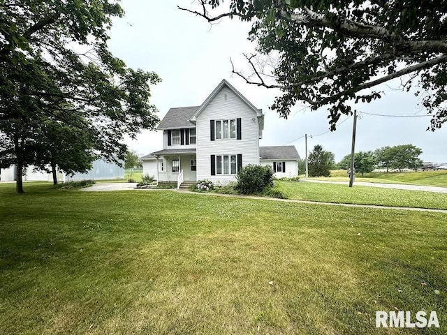 1626 210th St, Reynolds, IL 61279 - view of front of house with a front yard and covered porch